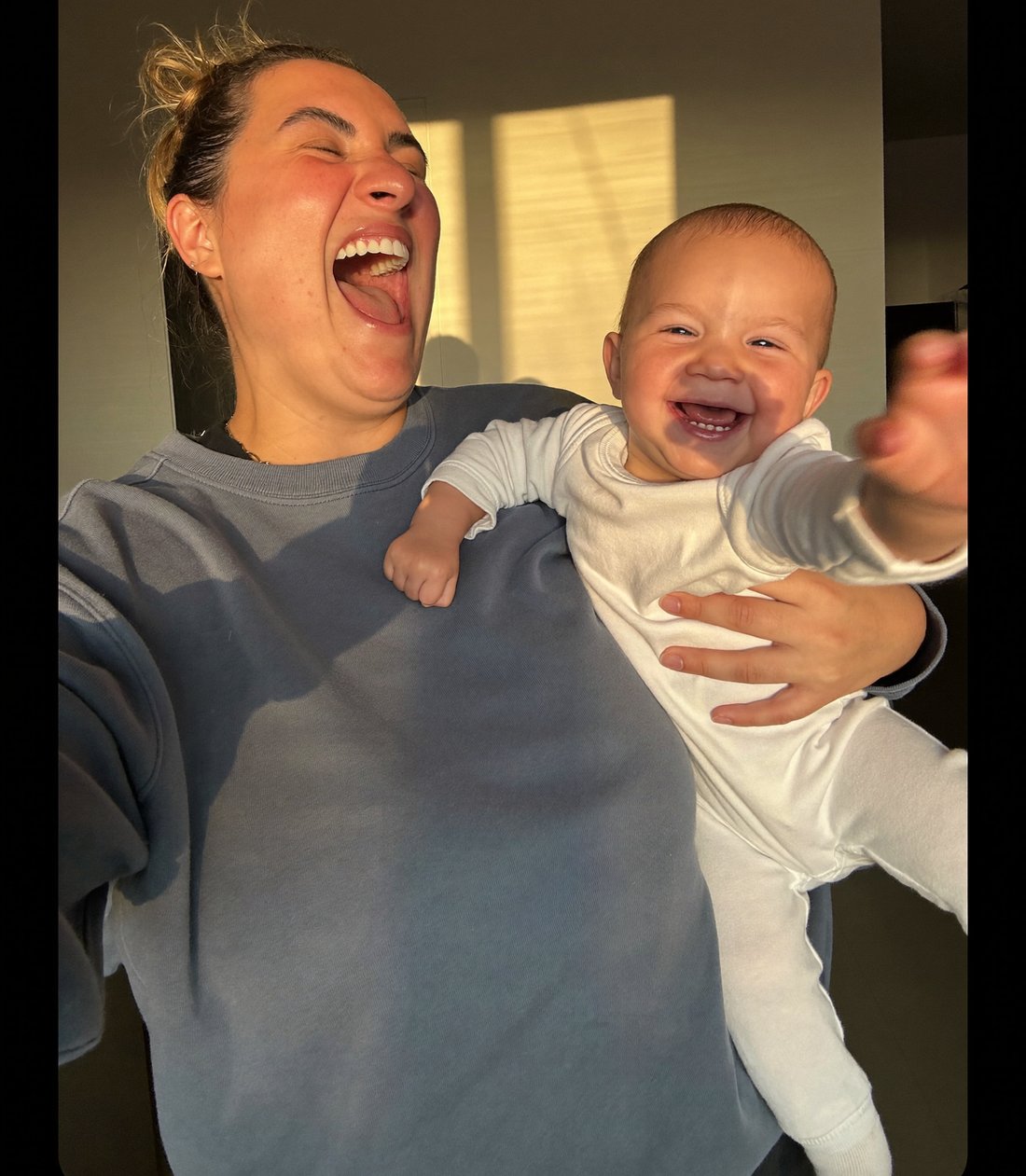Mom with her toddler in the kitchen