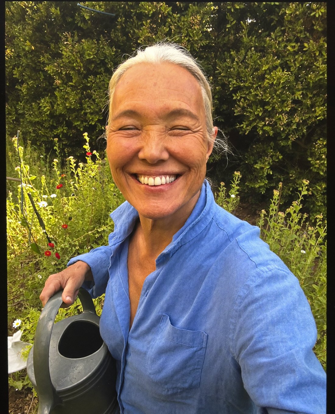 Radiant woman in her garden